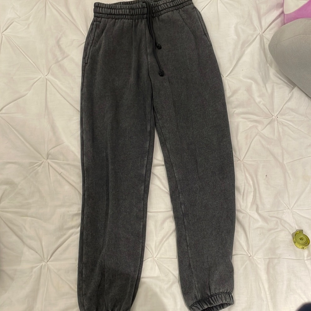 Dark grey Garage cuffed sweatpants with elastic waist, pockets and drawstring
